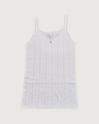 White tank top with thin straps on a light gray background